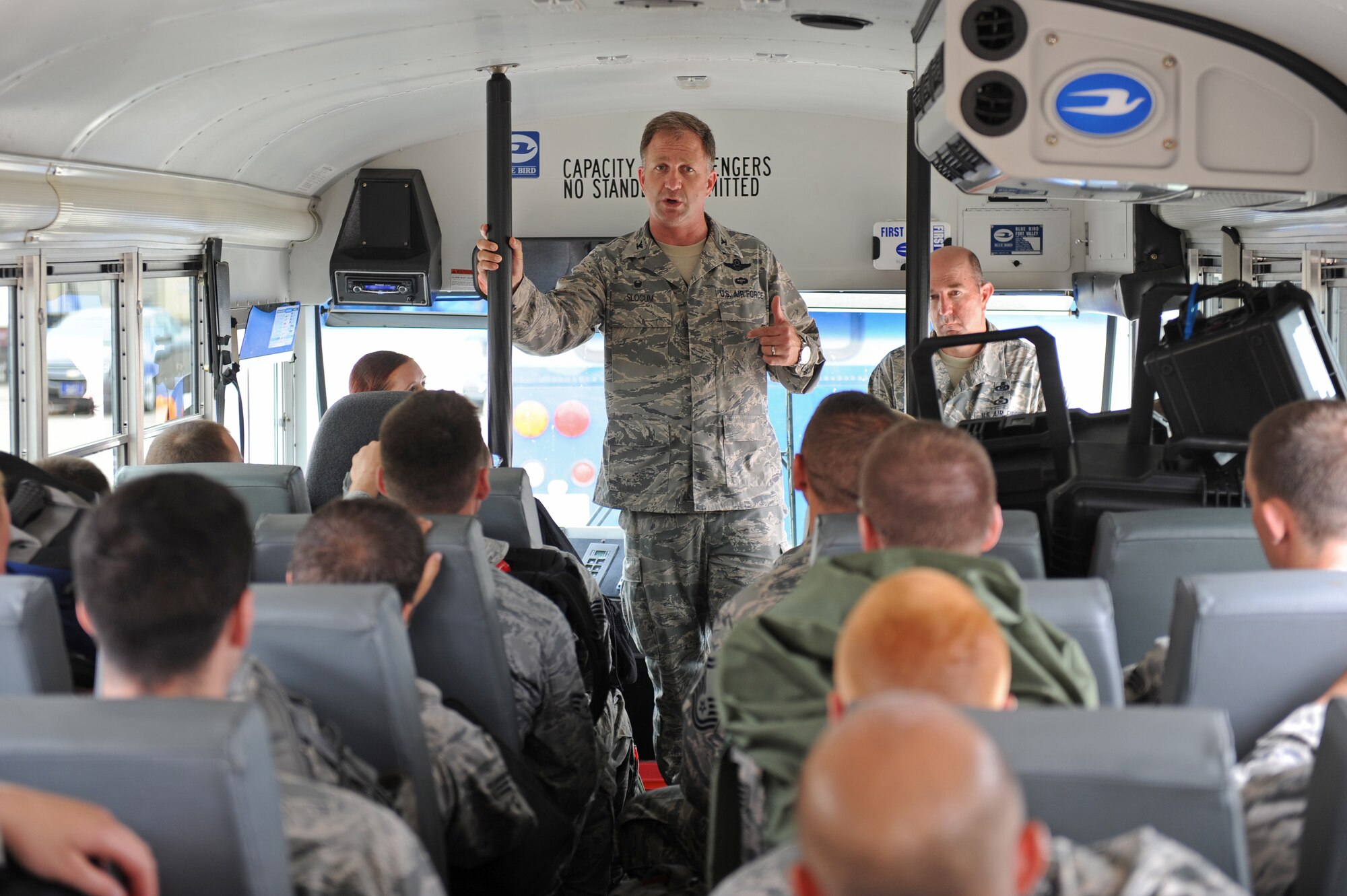 Col. Mark Slocum, 4th Fighter Wing commander, addresses Airmen assigned to the 4th Aircraft Maintenance Squadron as they prepare to accompany the wing’s aircraft to Wright-Patterson Air Force Base, Ohio July 3, 2014, at Seymour Johnson Air Force Base, North Carolina. More than 50 Strike Eagle aircraft were repositioned to Wright-Patterson AFB, as a precautionary measure to avoid potential damage from high winds associated with Hurricane Arthur. (U.S. Air Force photo/Airman 1st Class Aaron J. Jenne)