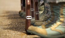Members of the Minot Air Force Base Honor practice ceremonial rifle techniques June 20, 2014. The Minot AFB Honor Guard is comprised of Airmen, NCO's and officers from the 5th Bomb Wing and 91st Missile Wing. (U.S. Air Force photo/Senior Airman Brittany Y. Bateman)