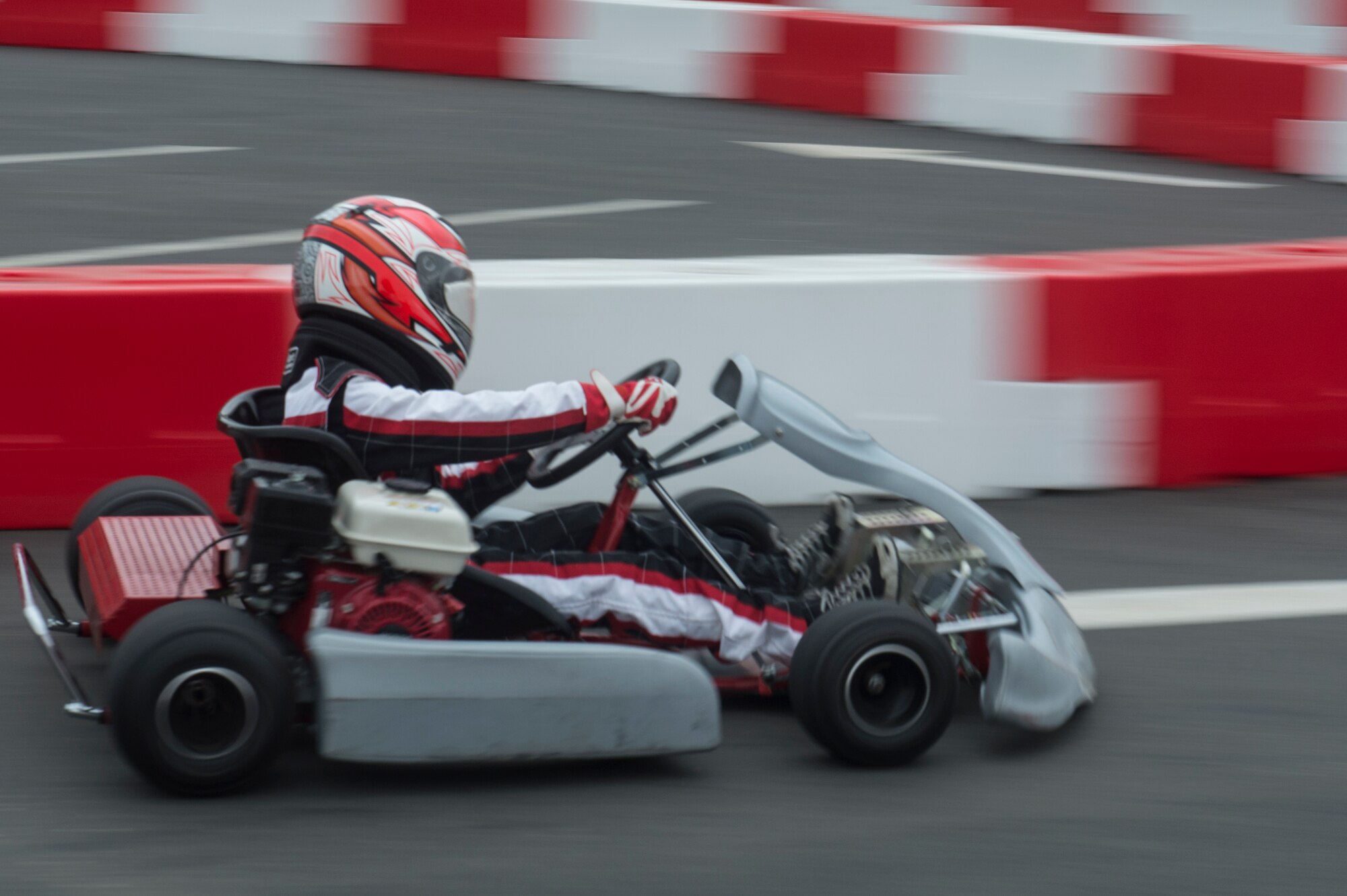 A Super Saber Appreciation Day patron drives a go-cart July 4, 2014, at Spangdahlem Air Base, Germany. The organizers held the event to give back to the community and celebrate Independence Day. (U.S. Air Force photo by Senior Airman Rusty Frank/Released)