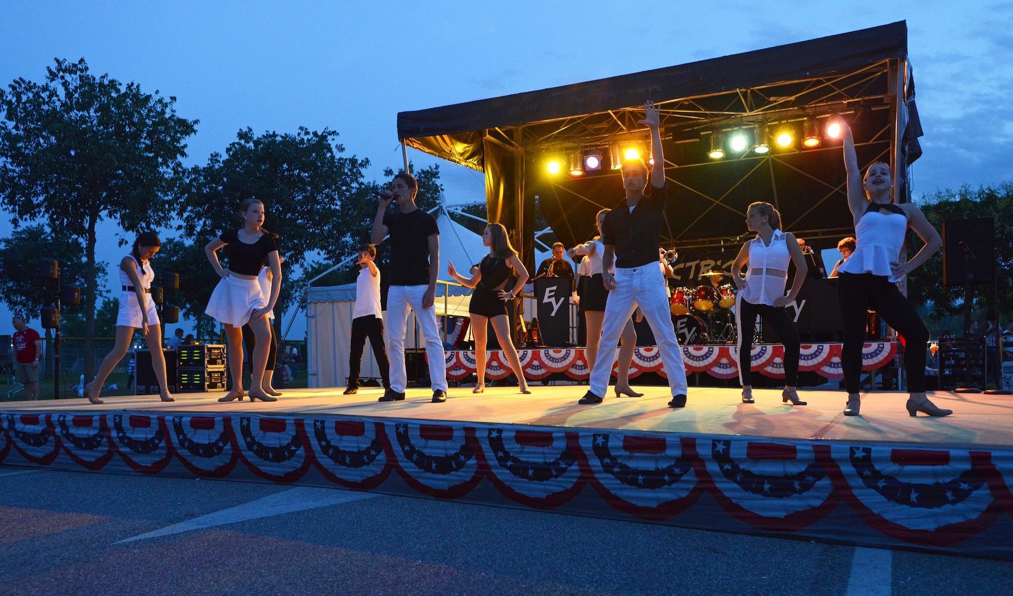 “Electric Youth,” a musical group from Franklin School for the Performing Arts, performs during the Fourth of July Celebration, July 4, 2014, at Aviano Air Base, Italy. The joint celebration gave Italians a unique opportunity to experience a little piece of America through food, community and celebrating our Independence Day.  (U.S Air Force photo/Airman 1st Class Deana Heitzman)