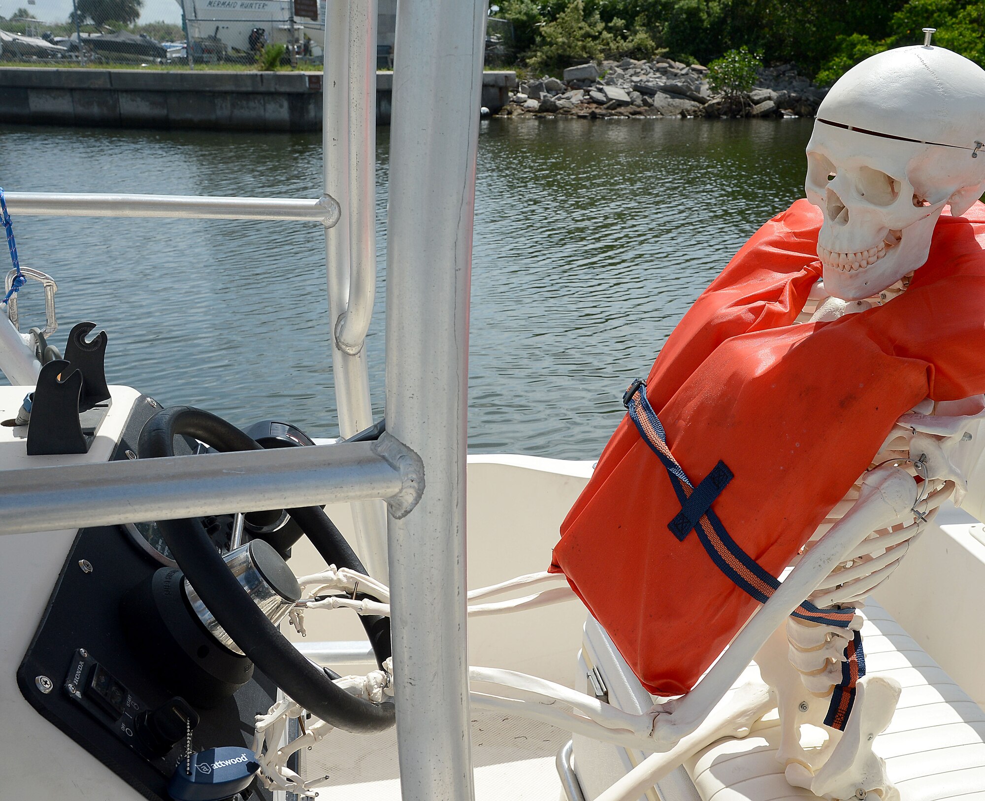 MacBones, 6th Air Mobility Wing safety skeleton, practices safe boating at MacDill Air Force Base, Fla., June 26, 2014. Always wear a life jacket while boating and participating in other water activities. (U.S. Air Force photo by Staff Sgt. Brittany Liddon/Released)