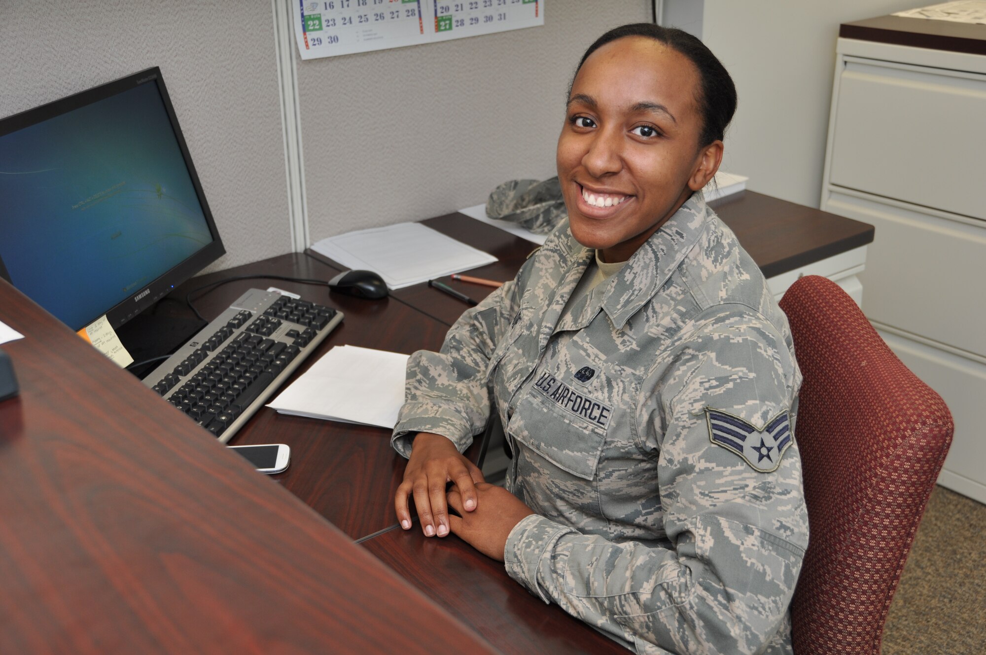 Senior Airman Valen Meade, knowledge operations specialist with the 911th Maintenance Operations Flight, has been a member of the 911th AW since she joined the Air Force Reserve in June 2011. She had first joined for schooling benefits, but now she stays in the service for travel opportunities and the honor of serving her country. (U.S. Air Force photo by Senior Airman Marjorie A. Bowlden)
