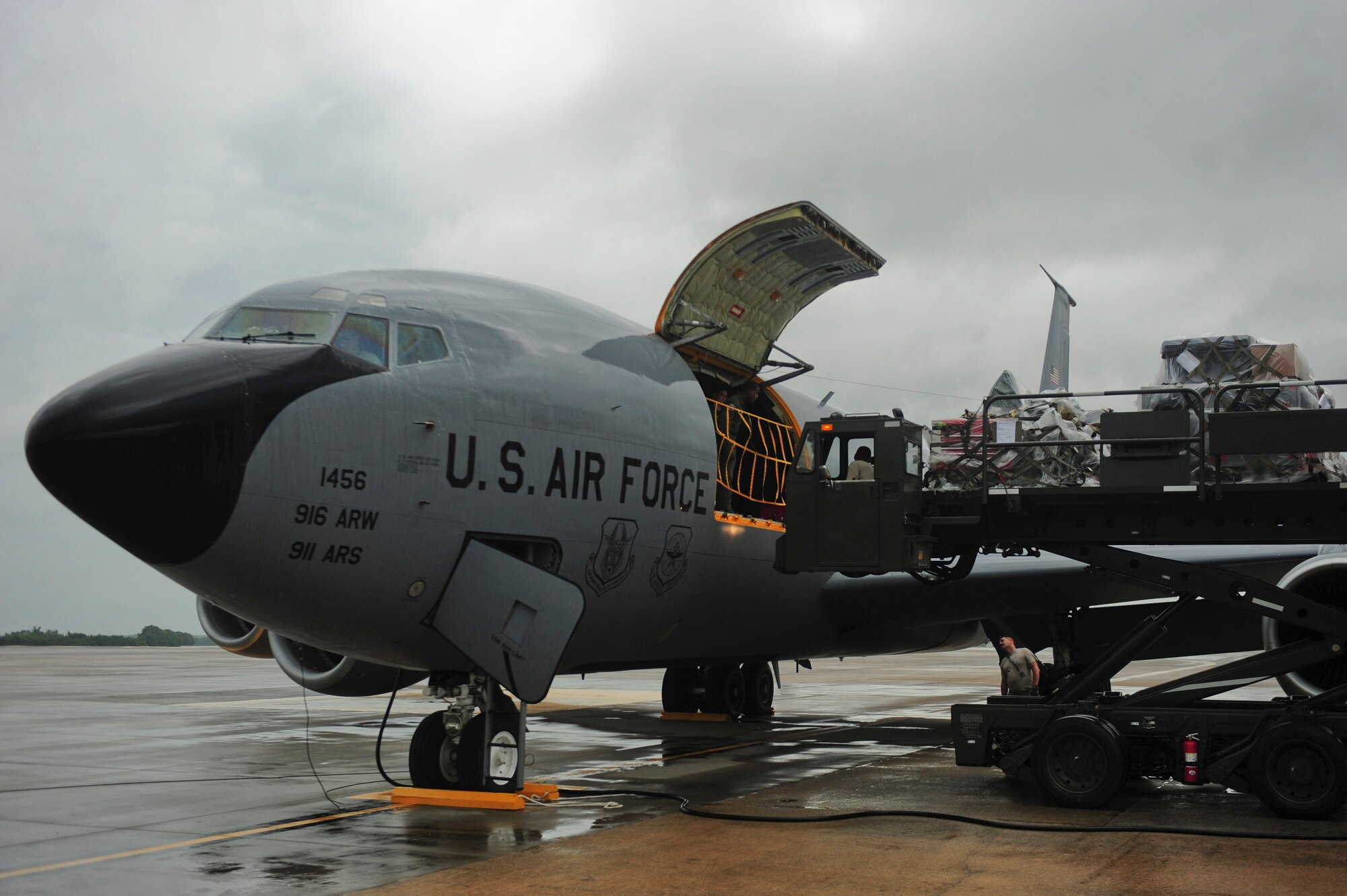 Tech. Sgt. Chester Moore, 4th Logistics Readiness Squadron NCO in charge of air terminal operations, loads a KC-135R Stratotanker with maintenance pallets, July 3, 2014 at Seymour Johnson Air Force Base, North Carolina. More than 50 F-15E Strike Eagles and four KC-135R aircraft were repositioned to Wright-Patterson Air Force Base, Ohio, as a precautionary measure to avoid potential damage from high winds associated with Hurricane Arthur. (U.S. Air Force photo/Airman 1st Class Brittain Crolley)