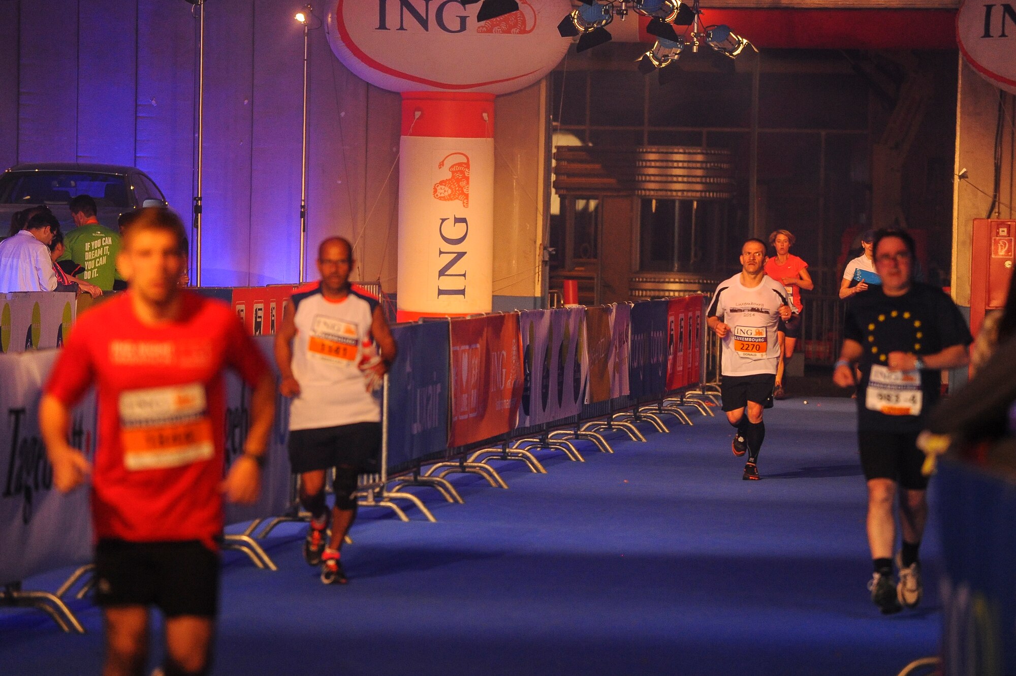 U.S. Air Force Master Sgt. Donald Stichter, 52nd Equipment Maintenance Squadron NCO in charge of munitions inspection from Lakewood, Colo., finishes the ING Luxembourg Night Marathon May 31, 2014, in Luxembourg. Stichter finished in the race in less than four-and-a-half hours. (U.S. Air Force photo by Senior Airman Rusty Frank/Released)