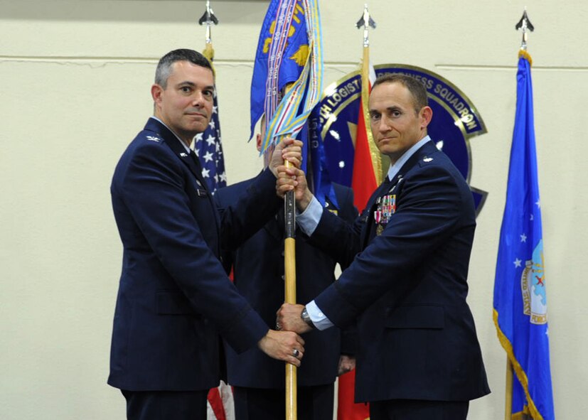 Lt. Col. James Gherdovich reliquishes command of the 39th Logistics Readiness Squadron to Col. Sean T. Gallagher, 39th Mission Support Group commander, June 12, 2014, Incirlik Air Base, Turkey. Gherdovich will continue his Air Force career at Barksdale Air Force Base, Louisiana. (U.S. Air Force photo by Staff Sgt. Eboni Reams/Released)