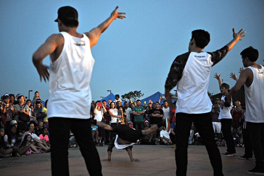 Members of the B-Boys entertain their audience during Liberty Fest at Osan Air Base, Republic of Korea, July 4, 2014. The group showcased their break dancing skills set to several popular songs. (U.S. Air Force photo/Airman 1st Class Ashley J. Thum)