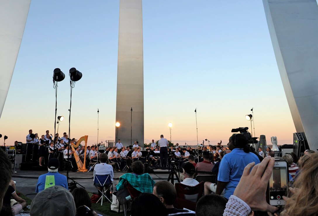 The United States Air Force Concert Band and Singing Sergeants perform at the Air Force Memorial on July 4, 2014, to celebrate Independence Day.  After the performances, attendees viewed the National Fireworks Show. (U.S. Air Force photo/ Senior Airman Mariah Haddenham)