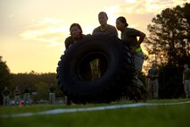 Marines and sailors with Combat Logistics Regiment 27, 2nd Marine Logistics Group competed in a head-to-head combat fitness challenge at Camp Lejeune, N.C., July 8, 2014. The regiment raised male and female teams of three from its various sections and had them complete tire flips, stretcher carries, and ammo-resupply runs as a way to test their combat fitness and forge a stronger bond between service members.



