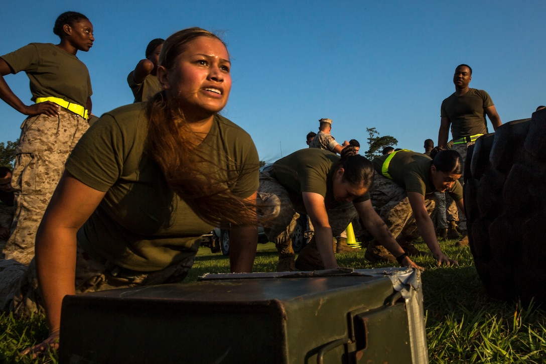 Marines and sailors with Combat Logistics Regiment 27, 2nd Marine Logistics Group competed in a head-to-head combat fitness challenge at Camp Lejeune, N.C., July 8, 2014. The regiment raised male and female teams of three from its various sections and had them complete tire flips, stretcher carries, and ammo-resupply runs as a way to test their combat fitness and forge a stronger bond between service members.


