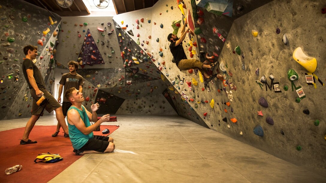 Corporal Tyler Bukoski, computer maintainer, 15th Marine Expeditionary Unit, works through a route at a rock climbing gym in Carlsbad, Calif., June 27, 2014. Bukoski, 22, is from Wanaque, New Jersey. (U.S. Marine Corps photo by Cpl. Emmanuel Ramos/Released)