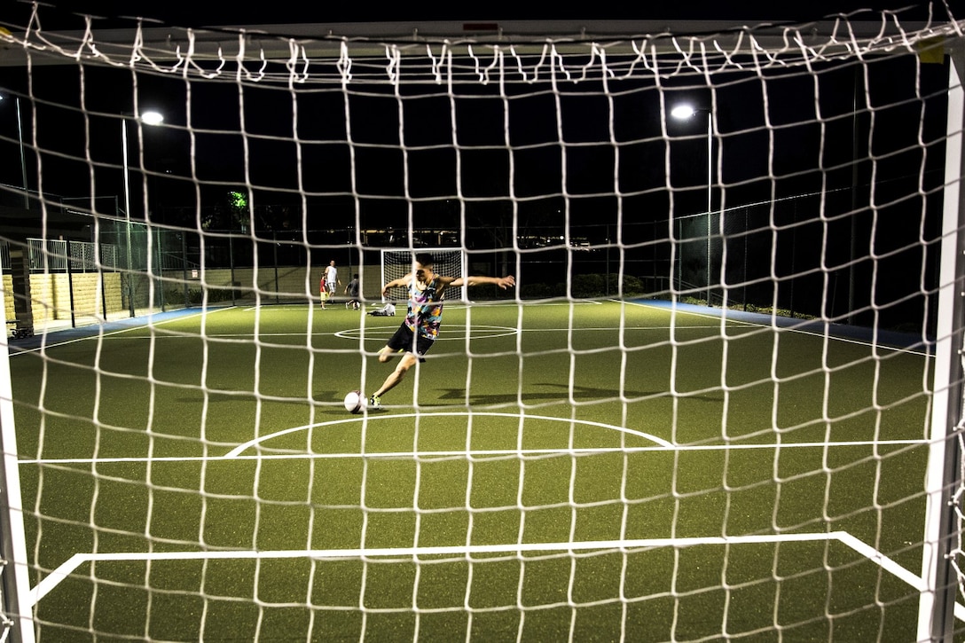 Corporal Rene Gonzalez, data network specialist, 15th Marine Expeditionary Unit, takes a practice shot in Oceanside, Calif., July 7, 2014. Gonzalez, 21, is from Joliet, Illinois, and is stationed aboard Camp Pendleton, Calif. (U.S. Marine Corps photo by Cpl. Emmanuel Ramos/Released)
