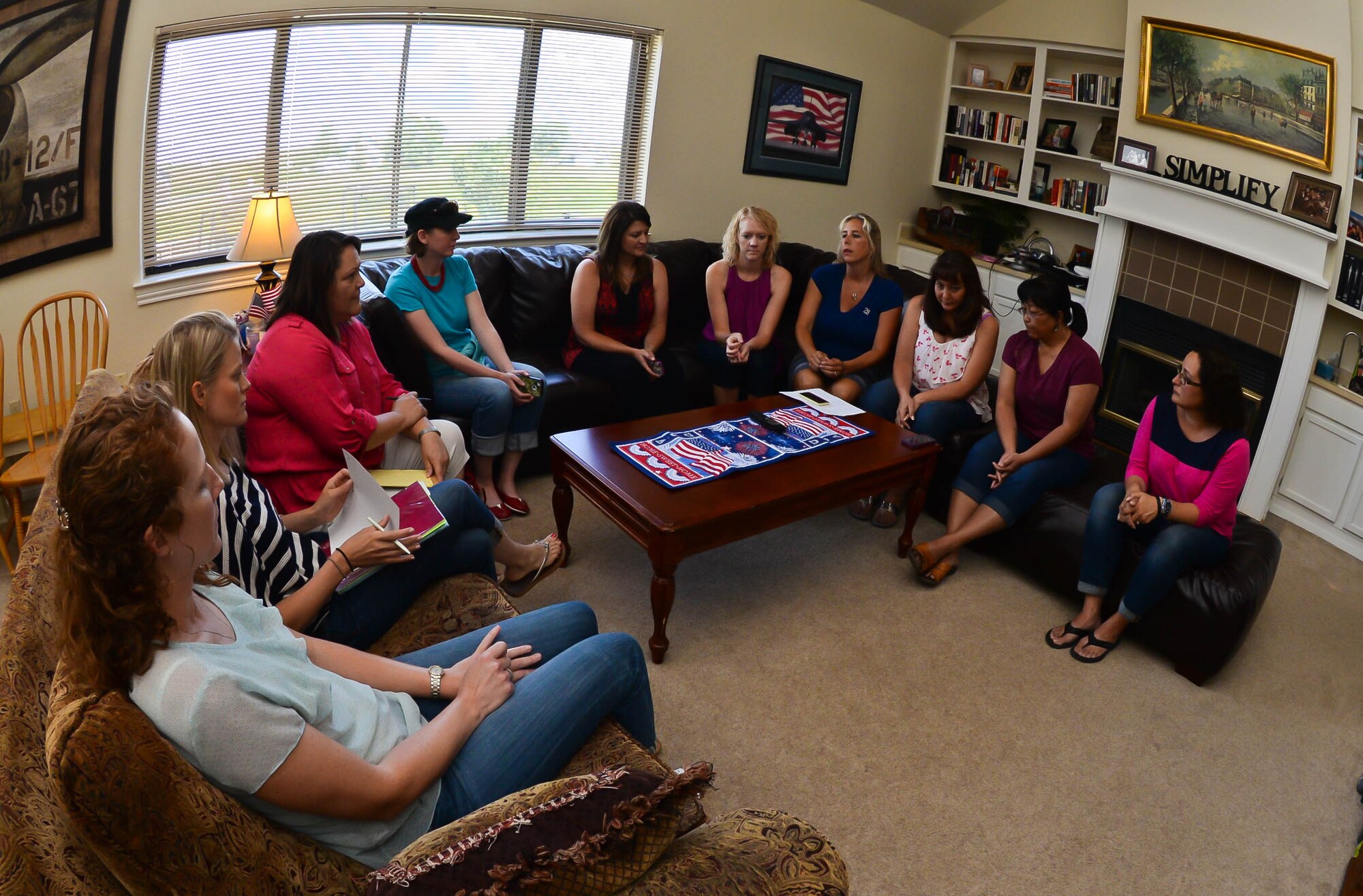 Key and senior enlisted spouses participated in a teleconference at Ellsworth Air Force Base, S.D., July 9, 2014 as part of a virtual focus group session prior to an upcoming Integrated Process Team hosted by the Headquarters Air Force Personnel Center Airman Family Care Directorate. The goal for the IPT is to evaluate current guidance, training, and make necessary program updates to meet the needs of the Air Force community. (U.S. Air Force photo by Senior Airman Zachary Hada/Released)