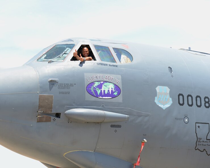 Chef Jeff Henderson, Flip My Food host, gives two thumbs up in the cockpit of a B-52H Stratofortress on Barksdale Air Force Base, La., July 9, 2014. During the filming of an episode, Henderson cooked healthy meals for the Airmen and received a tour of a B-52. (U.S. Air Force photo/Senior Airman Benjamin Gonsier) 