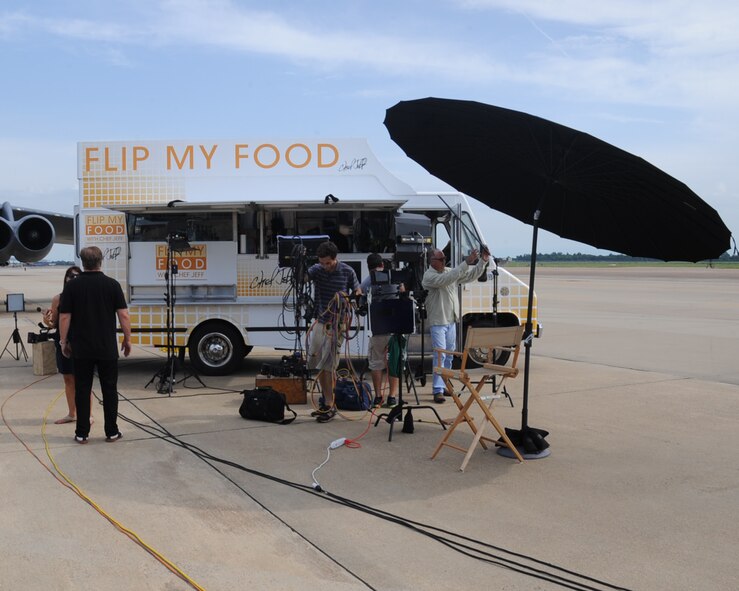 The crew from Flip My Food sets up for a taping on Barksdale Air Force Base, La., July 9, 2014. The show came to Barksdale to show Airmen a healthier way of cooking everyday meals. (U.S. Air Force photo/Staff Sgt. Sean Martin)