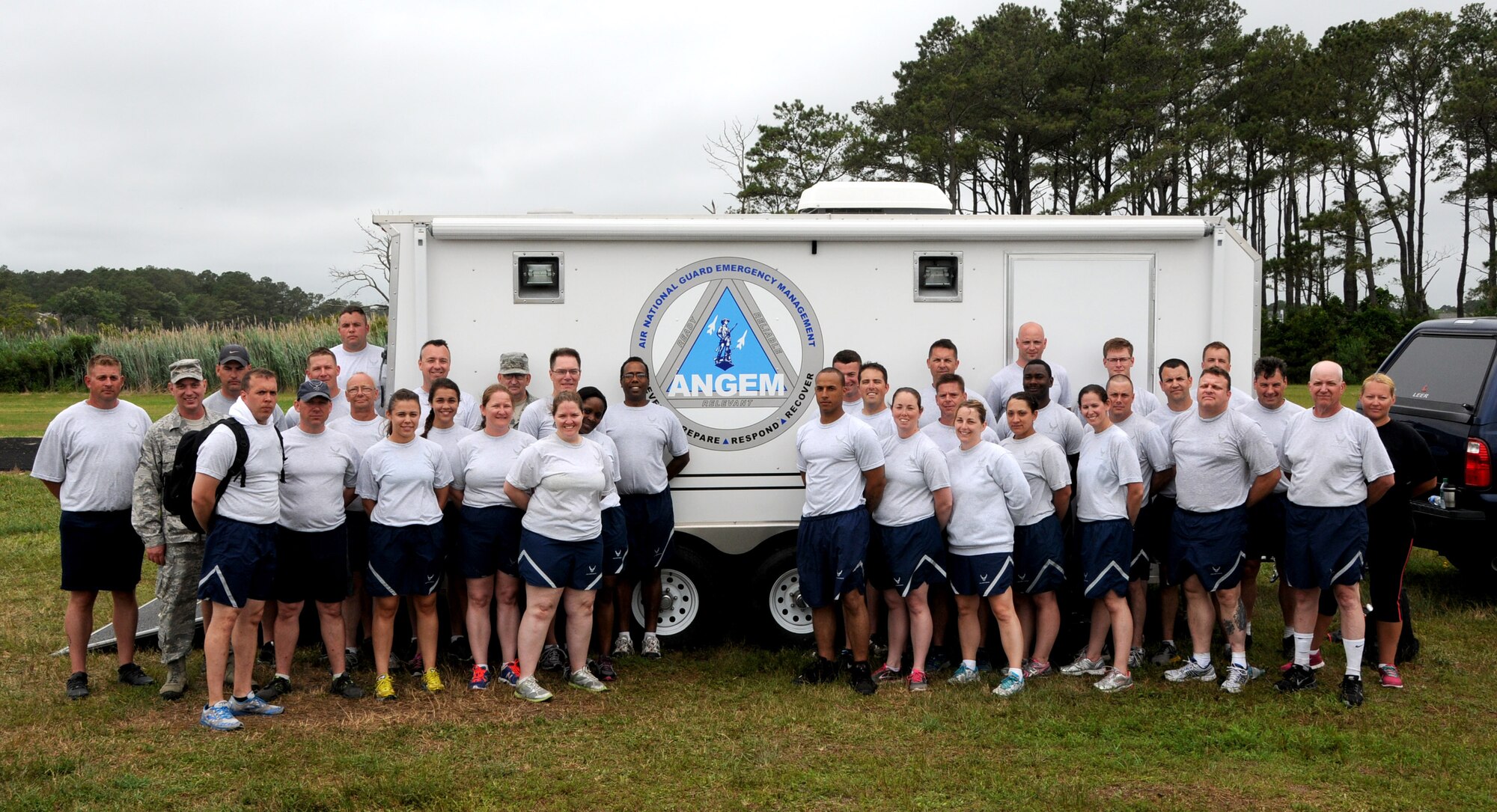 Emergency Management specialists pose for a photo after the Region 3 Management Training exercise at the Bethany Beach Regional Training Institute, Delaware Air National Guard June 27, 2014. More than 40 emergency managers comprised from the District of Columbia, Delaware, Maryland, and Pennsylvania Air National Guard participated in the inaugural Region 3 training exercise. (Air National Guard photo by Master Sgt. Craig Clapper/released)  