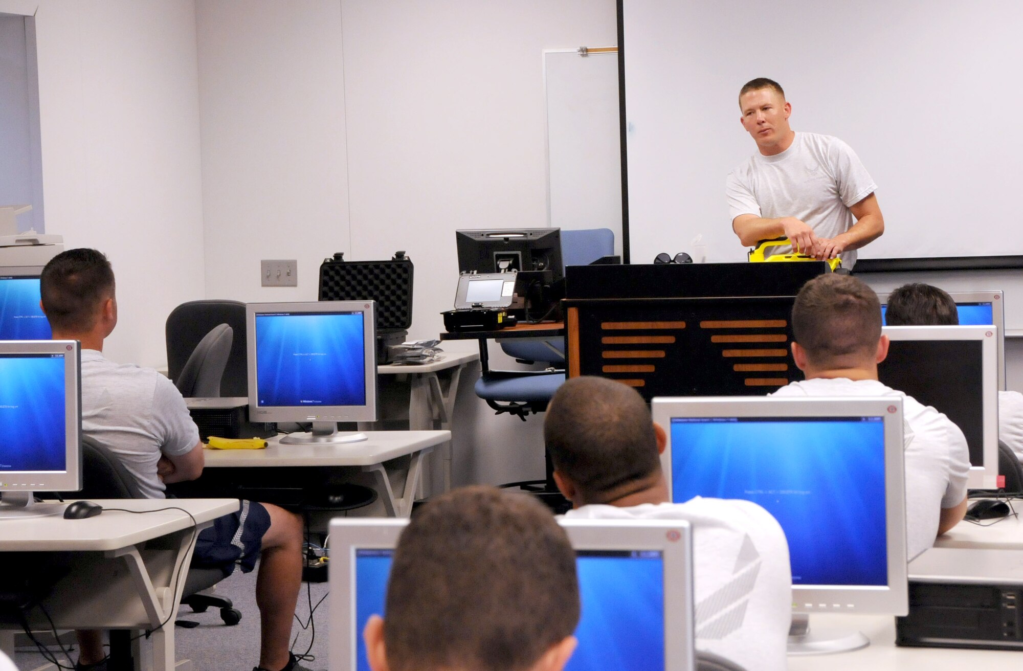 Staff Sgt. Brent Nealy, 175th Wing, Maryland Air National Guard, instructs fellow Emergency Management specialists on equipment and procedures during the Region 3 Emergency Management training exercise, Bethany Beach Regional Training Institute, Delaware Air National Guard June 27, 2014. More than 40 emergency managers comprised from the District of Columbia, Delaware, Maryland, and Pennsylvania Air National Guard participated in the inaugural Region 3 training exercise. (Air National Guard photo by Master Sgt. Craig Clapper/Released) 