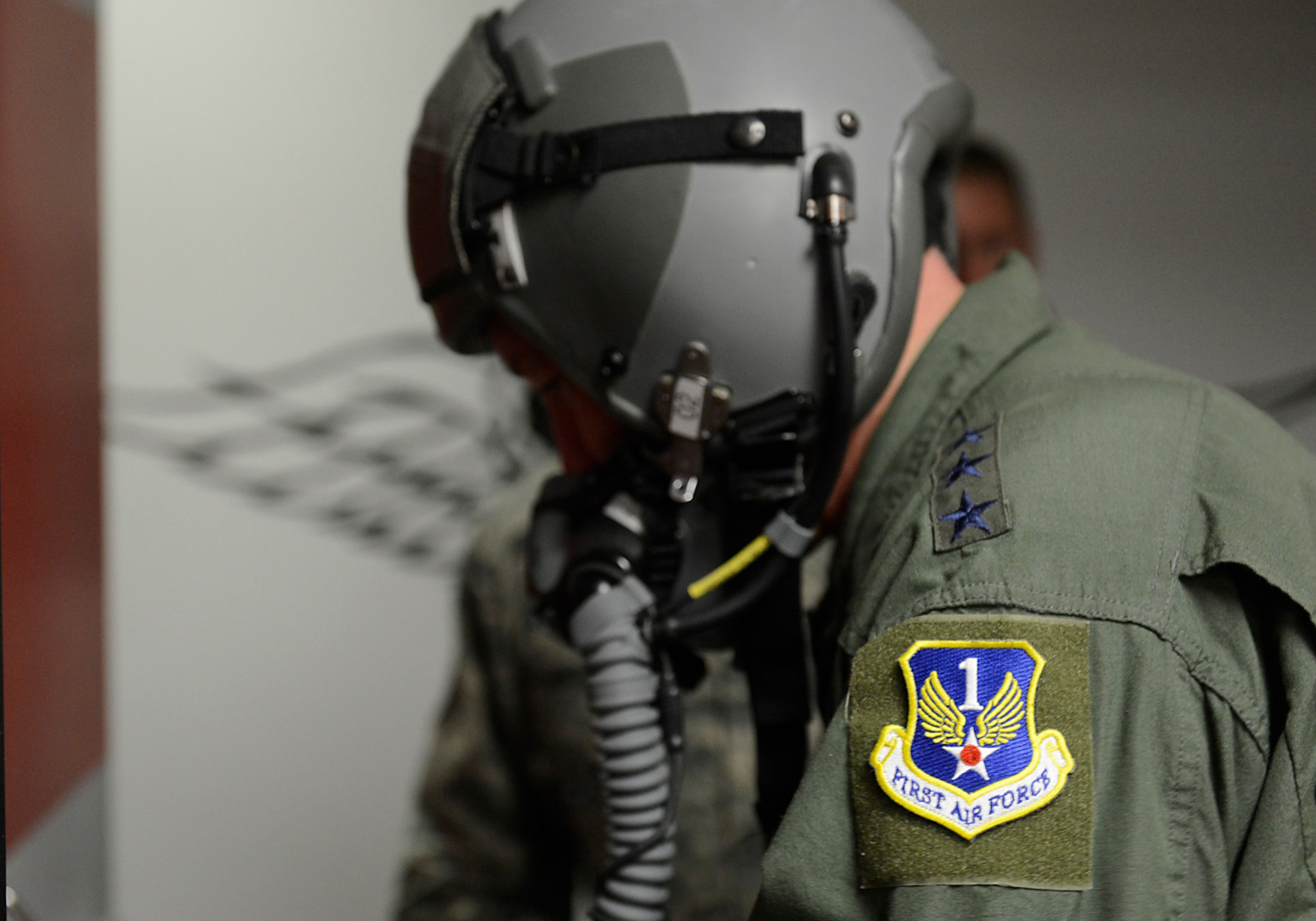 First Air Force Commander, Lt Gen William Etter, conducts a pre-flight equipment check during a visit at the 138th Fighter Wing in Tulsa Okla., 24 June 2014. Etter stopped at the 138th for a brief visit and to fly a training mission with the F-16 pilots of the 125th Fighter Squadron. (U.S. National Guard photo by Senior Master Sgt. Preston L. Chasteen/Released)