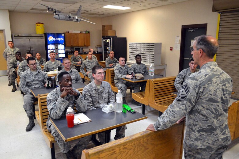 Chief Master Sgt. Pete Stone, U.S. Air Force Expeditionary Center command chief, discusses enlisted issues with 2nd Airlift Squadron Airmen during his tour of 43rd Airlift Group units on July 8, 2014, Pope Army Airfield, N.C. (U.S. Air Force photo/Marvin Krause)