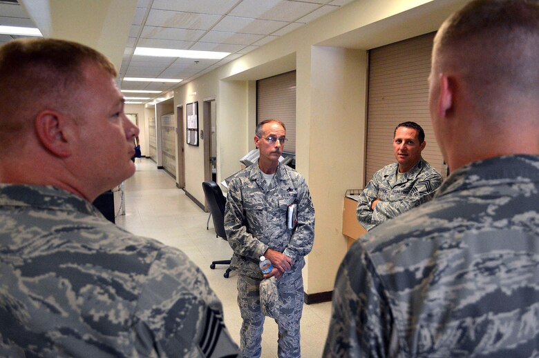 Chief Master Sgt. Pete Stone, U.S. Air Force Expeditionary Center command chief, discusses enlisted issues with 2nd Airlift Squadron Airmen during his tour of 43rd Airlift Group units on July 8, 2014, Pope Army Airfield, N.C. (U.S. Air Force photo/Marvin Krause)