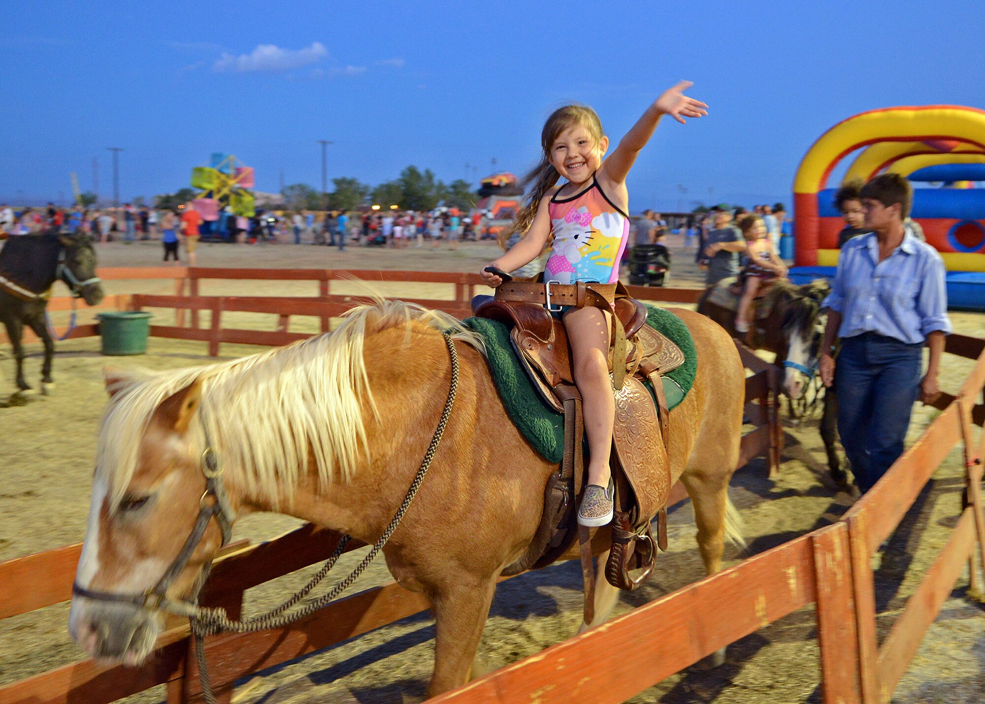 The pony ride was just one of the many attractions that were available to children and attendees during the 2014 Freedom Fest on Roberts Field July 4. (U.S. Air Force photo by Jet Fabara)