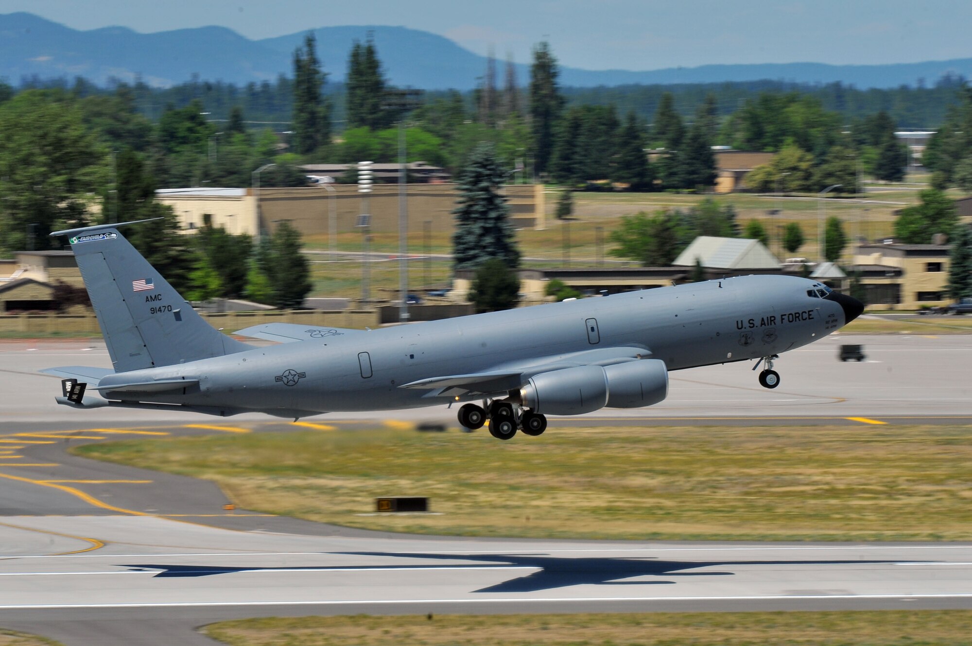 Members from the 509th Weapons Squadron take off the runway in a KC-135 Stratotanker to execute minimum interval takeoff procedures for the first time in twenty years reduced July 8, 2014 at Fairchild Air Force Base, Wash.  The 509th WPS mission is to provide the world's most advanced training in weapons and tactics employment to officers of the Air Force. (U.S. Air Force photo by Staff Sgt. Veronica Montes/Released)