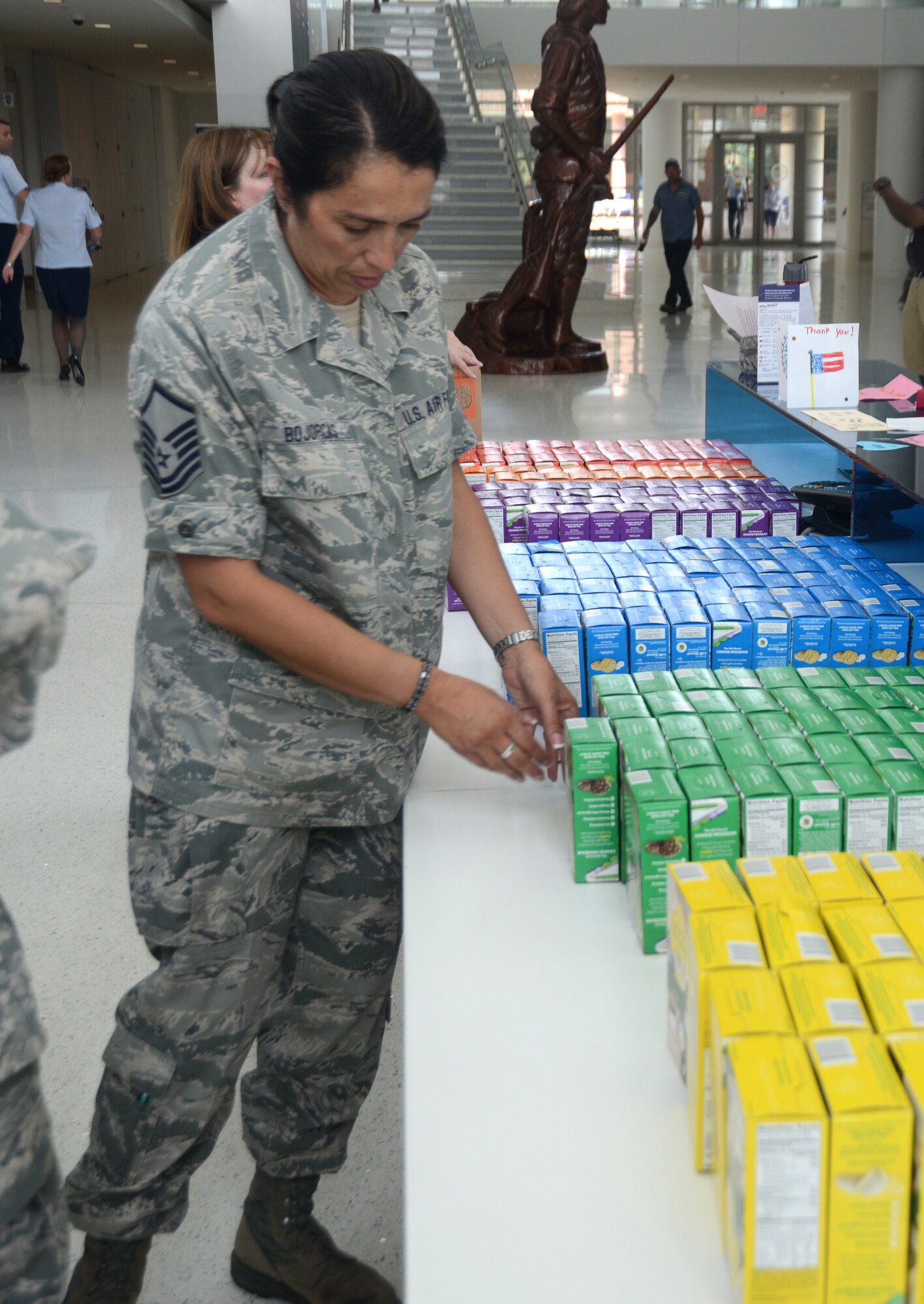 Master Sgt. Michelle L. Bojorcas, Air National Guard protocol non-commissioned officer, prepares to distribute Gil Scout cookies to the men and women of the Air National Guard Readiness Center at Joint Base Andrews, Md., July 2, 2014.  More than 1,500 boxes of cookies were donated to the ANGRC by Girl Scouts from the Hudson River valley, N.Y. (U.S. Air National Guard photo by Senior Airman John E. Hillier/Released)