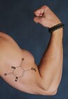 The above photo illustrates a flexed arm with the chemical structure of protein on a bicep. Approximately 20 percent of U.S. Armed Forces active-duty personnel use protein supplements. (U.S. Air Force photo illustration/Senior Airman Katrina Heikkinen)