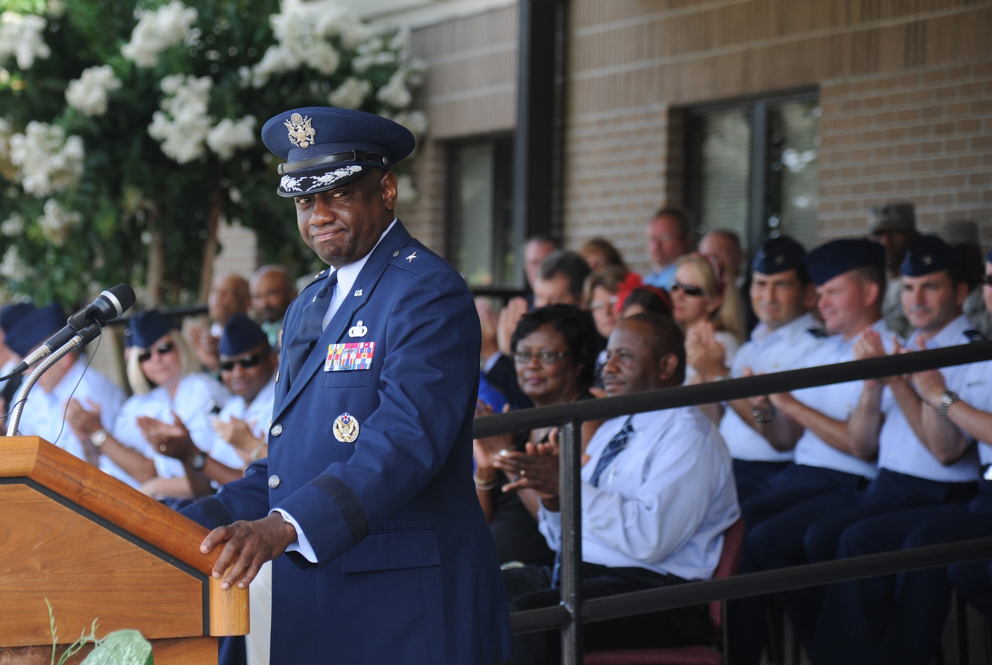 Brig. Gen. Mark Brown, incoming 2nd Air Force commander, prepares to deliver remarks during the 2nd Air Force change of command ceremony July 3, 2014, at Keesler Air Force Base, Miss.  Brown was previously the Financial Management director, Headquarters Air Force Material Command at Wright-Patterson Air Force Base, Ohio. He replaces Maj. Gen. Leonard Patrick, who's headed to Randolph Air Force Base, Texas, where he will become the AETC vice commander.  (U.S. Air Force photo by Kemberly Groue)