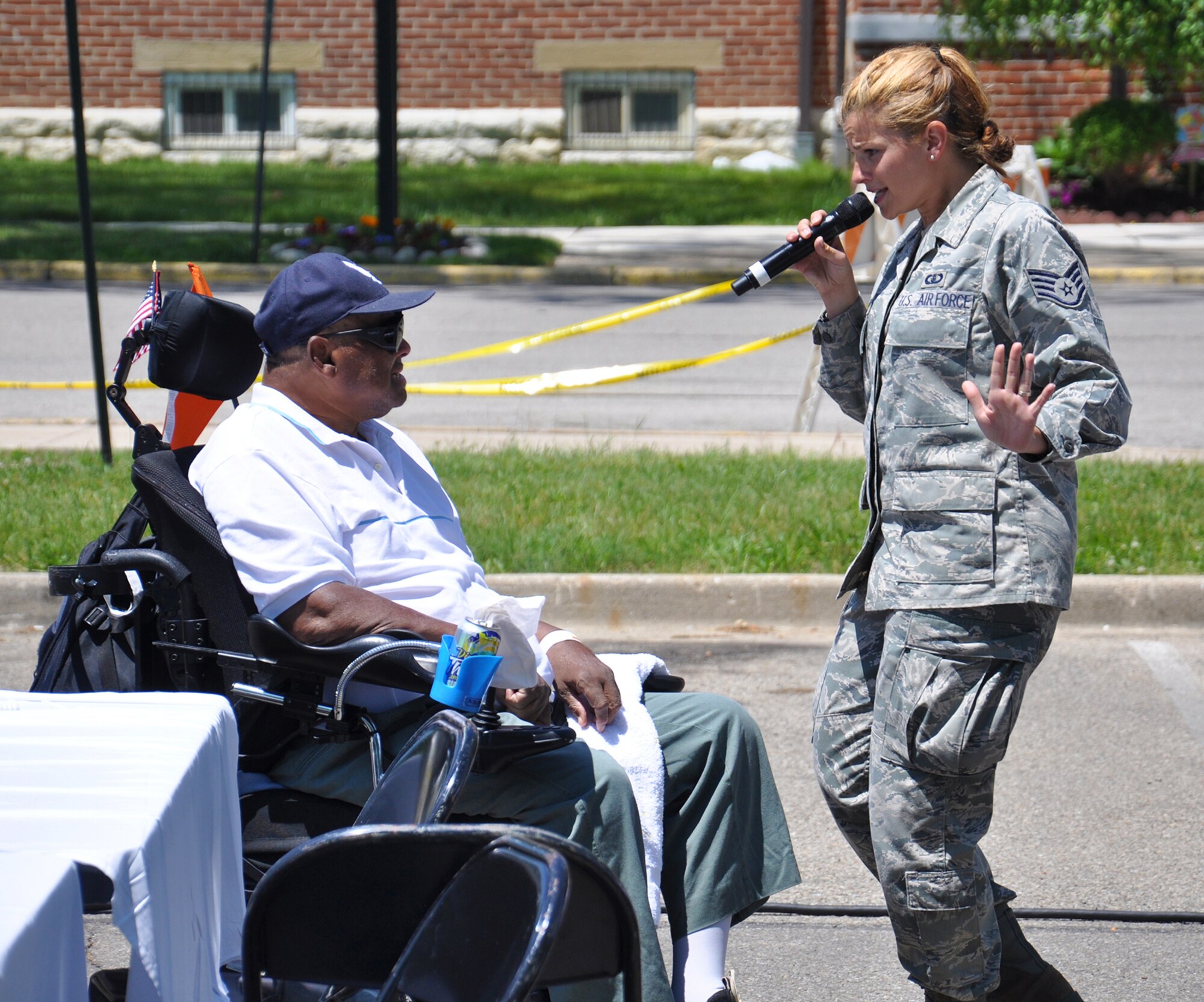DAYTON, OHIO - Air Force Band of Flight’s “Systems Go” performer Staff Sgt. Kelly Perry, vocalist, performs for more than 250 residents and families of the Dayton Veterans Affairs Medical Center June 7. Members of the 88th Air Base Wing and 445th Airlift Wing gathered at the VA for food, fellowship and fun at the annual VAMC picnic, a mainstay since 1996 for VAMC residents. (U.S. Air Force photo/Tech. Sgt. Patrick O’Reilly)