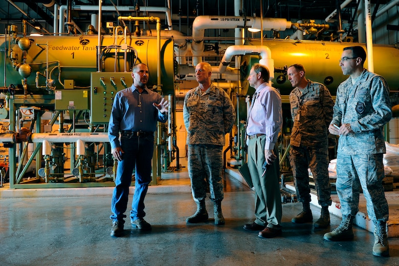 Lt. Gen. Jay Raymond (second from left), 14th Air Force commander, tours the Central Utility Plant June 30, 2014, at Schriever Air Force Base, Colo. Raymond visited Team Schriever to see the base’s missions and meet with Airmen. (U.S. Air Force photo/Christopher DeWitt)