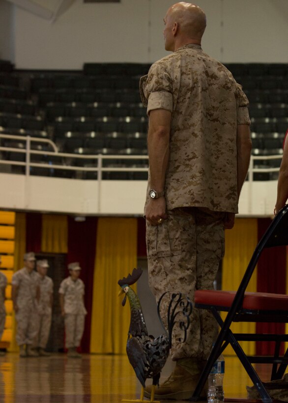 U.S. Marine Corps Col. Matthew G. St. Clair, the outgoing commanding officer of the 26th Marine Expeditionary Unit (MEU), stands at attention as the Marines Hymn is performed during the unit’s change of command ceremony aboard Camp Lejeune, N.C., June 25, 2014. Col. Matthew G. St. Clair relinquished command of the 26th MEU to Col. Robert C. Fulford. (U.S. Marine Corps Photo by Lance Cpl. Joshua W. Brown, 26th MEU Public Affairs/ Released)