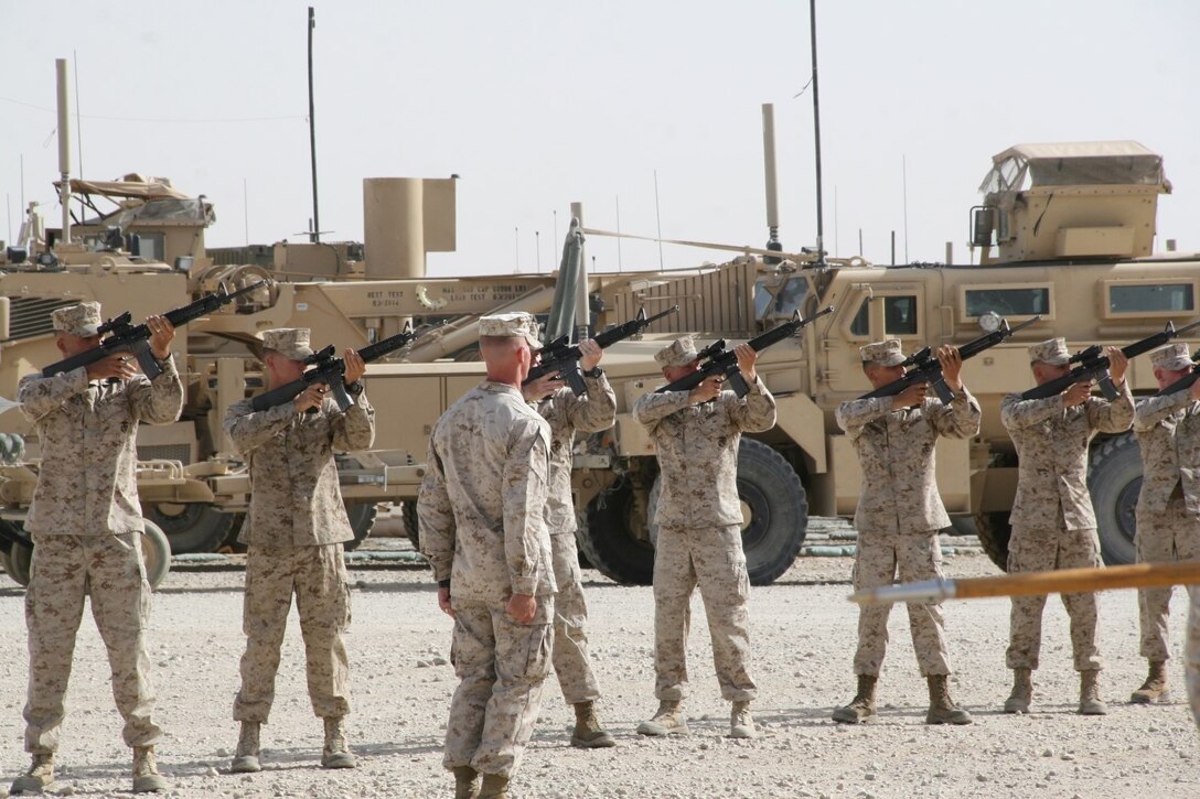A Marine rifle detail with 2nd Combat Engineer Battalion shoots a volley of three rounds in honor of three fallen Marines during a memorial ceremony aboard Camp Leatherneck, Afghanistan, July 8, 2014. The service was held to honor Staff Sgt. David H. Stewart, a combat engineer, platoon sergeant and native of Stafford, Virginia; Cpl. Brandon J. Garabrant, a combat engineer and native of Peterborough, New Hampshire; and Cpl. Adam F. Wolff, a combat engineer and native of Cedar Rapids, Iowa, all Marines serving with 3rd Platoon, Route Clearance Company, 2nd Combat Engineer Battalion, who gave the ultimate sacrifice while conducting combat operations in Helmand province, Afghanistan, June 20, 2014.