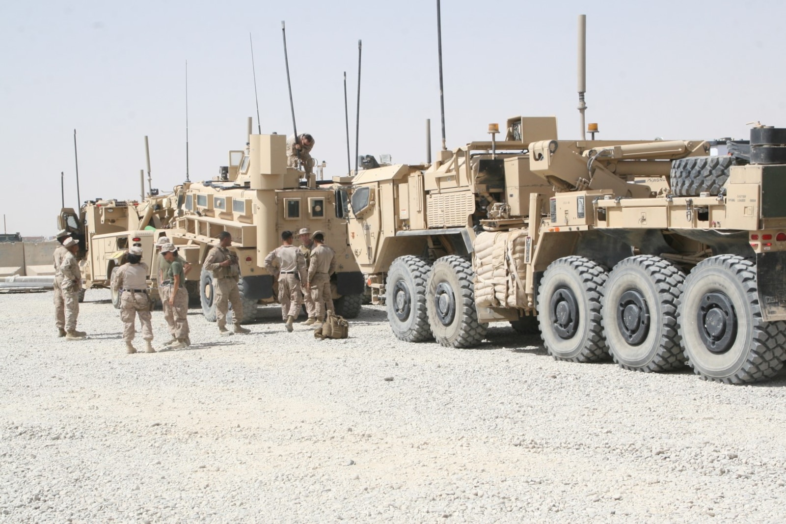 Marines with Redeployment and Retrograde in support of Reset and Reconstitution Operations Group secure equipment to tactical vehicles aboard Camp Leatherneck, Helmand province, Afghanistan, July 1, 2014. R4OG was established during April 2012 and has a significant role as the unit responsible for bringing all Marine Corps gear home from Afghanistan.