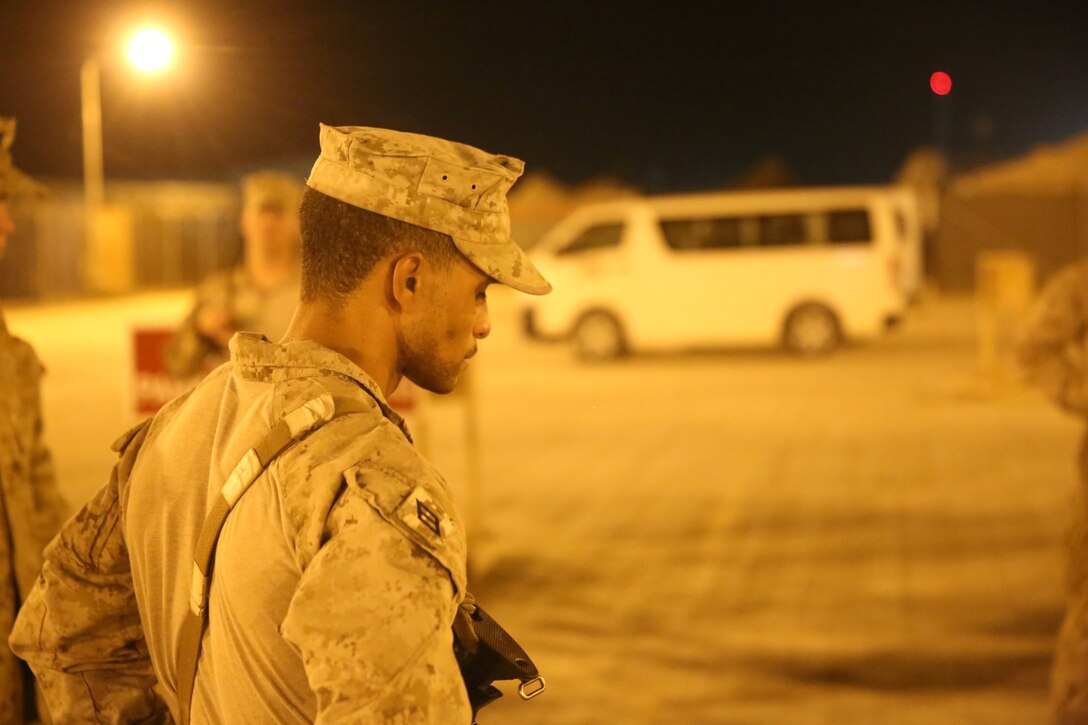 Seaman Timothy Clay, corpsman, 1st Battalion, 7th Marine Regiment, and a native of Piqua, Ohio, looks down after receiving heartbreaking news regarding Sgt. Thomas Z. Spitzer aboard Camp Leatherneck, Afghanistan, June 25, 2014. Spitzer, a 23-year-old native of New Braunfels, Texas, was killed while conducting combat operations in Helmand province, Afghanistan, June 25.
(U.S. Marine Corps photo by Cpl. Joseph Scanlan / released)