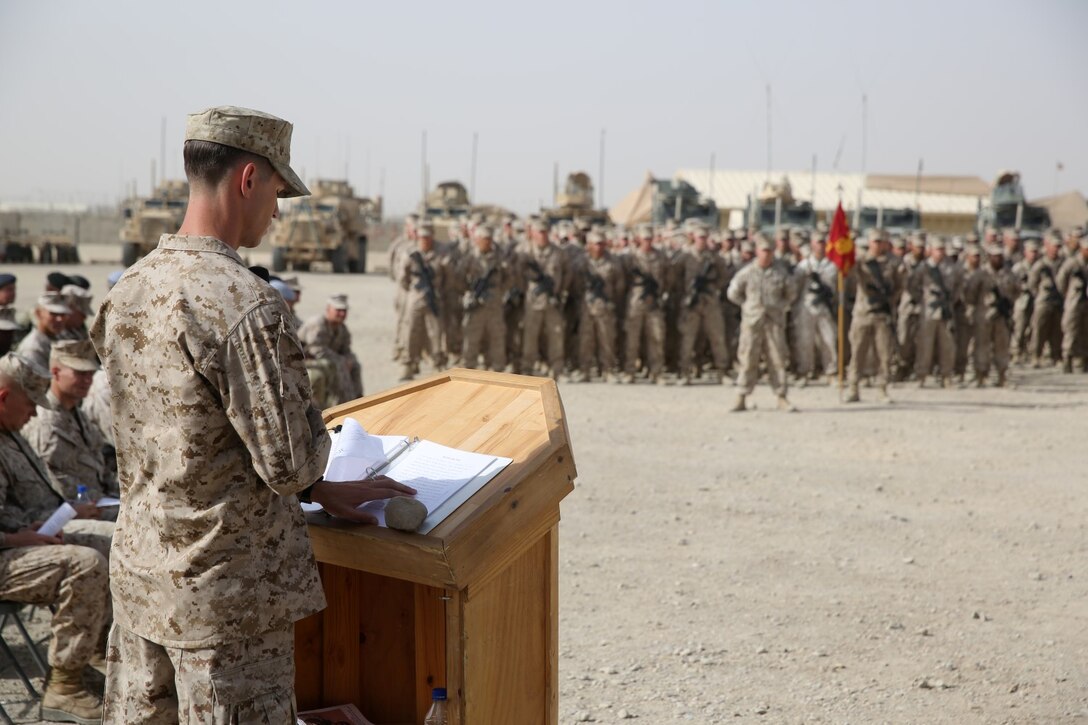Sergeant Louis Wood, scout sniper, Scout Sniper Platoon, 1st Battalion, 7th Marine Regiment, and a native of Fort Worth, Texas, speaks during a memorial ceremony aboard Camp Leatherneck, July 2, 2014. The memorial was in honor of Sgt. Thomas Z. Spitzer, a professionally instructed gunman with Scout Sniper Platoon, 1st Bn., 7th Marines, who was killed while conducting combat operations in Helmand province, Afghanistan, June 25, 2014.
(U.S. Marine Corps photo by Cpl. Joseph Scanlan / released)