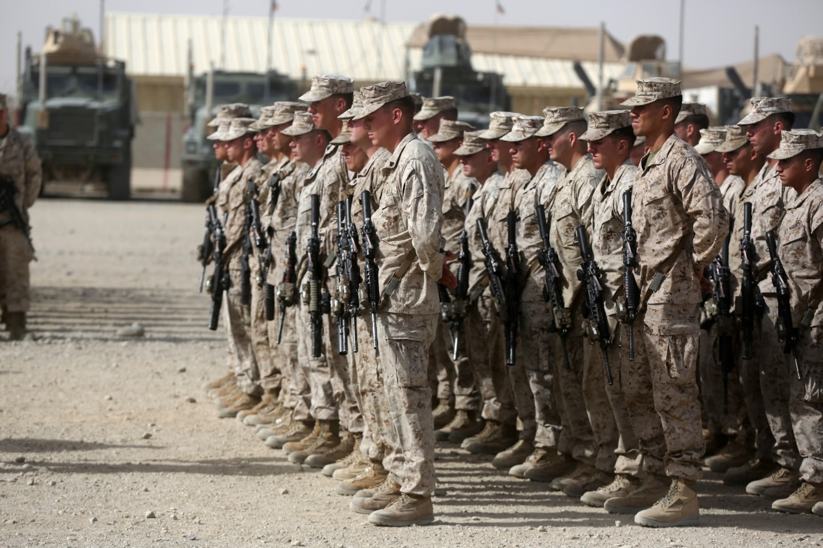 Marines with 1st Battalion, 7th Marine Regiment, stand at parade rest during a memorial ceremony aboard Camp Leatherneck, July 2, 2014. The memorial was in honor of Sgt. Thomas Z. Spitzer, a professionally instructed gunman with Scout Sniper Platoon, 1st Bn., 7th Marines, who was killed while conducting combat operations in Helmand province, Afghanistan, June 25, 2014.
(U.S. Marine Corps photo by Cpl. Joseph Scanlan / released)
