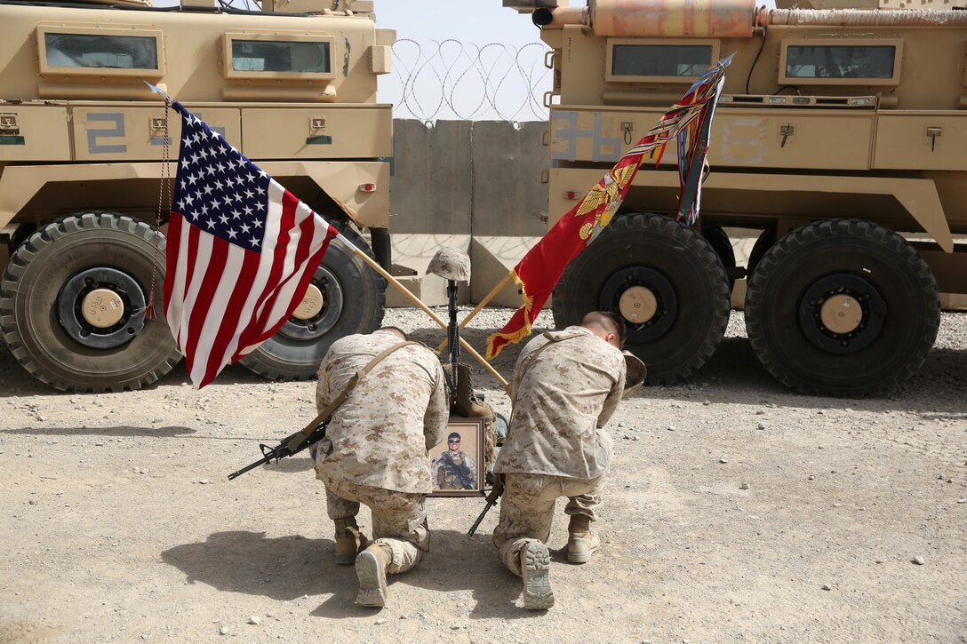 Marines 1st Battalion, 7th Marine Regiment, pay their respects Sgt. Thomas Z. Spitzer during a memorial ceremony aboard Camp Leatherneck, July 2, 2014. The memorial was in honor of Spitzer, a professionally instructed gunman with Scout Sniper Platoon, 1st Bn., 7th Marines, who was killed while conducting combat operations in Helmand province, Afghanistan, June 25, 2014.
(U.S. Marine Corps photo by Cpl. Joseph Scanlan / released)