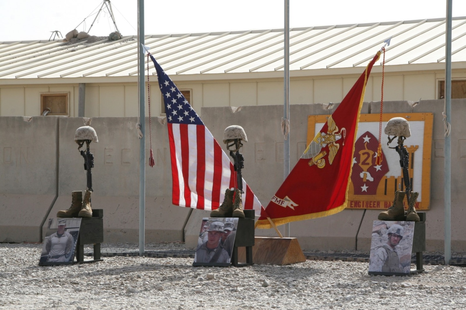 Three battlefield crosses stand in honor of three fallen Marines during a memorial ceremony aboard Camp Leatherneck, Afghanistan, July 8, 2014. The service was held to honor, from left to right, Staff Sgt. David H. Stewart, a combat engineer, platoon sergeant and native of Stafford, Virginia; Cpl. Brandon J. Garabrant, a combat engineer and native of Peterborough, New Hampshire; and Cpl. Adam F. Wolff, a combat engineer and native of Cedar Rapids, Iowa, all Marines serving with 3rd Platoon, Route Clearance Company, 2nd Combat Engineer Battalion, who gave the ultimate sacrifice while conducting combat operations in Helmand province, Afghanistan, June 20, 2014.