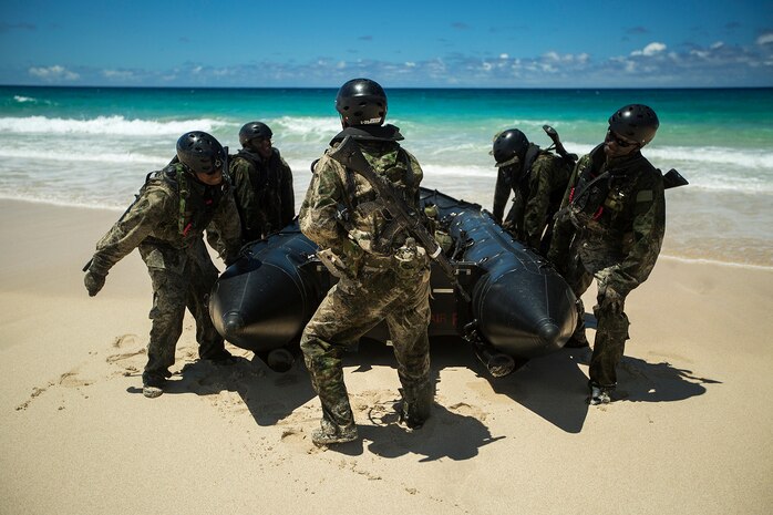 Japan Ground Self-Defense Force (JGSDF) soldiers anchor their amphibious warfare vessel on Pyramid Rock Beach during an amphibious assault. The JGSDF conducted the training exercise with U.S. Marines with 3rd Reconnaissance Battalion, based in Okinawa, Japan. The world's largest international maritime exercise, Rim of the Pacific (RIMPAC) Exercise 2014, provides a unique training opportunity that helps participants foster and sustain the cooperative relationships that are critical to ensuring the safety of sea lanes and security on the world's oceans. Twenty-two nations, more than 40 ships, six submarines, more than 200 aircraft and 25,000 personnel are participating in RIMPAC.