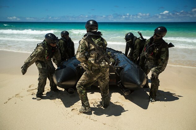 Japan Ground Self-Defense Force (JGSDF) soldiers anchor their amphibious warfare vessel on Pyramid Rock Beach during an amphibious assault. The JGSDF conducted the training exercise with U.S. Marines with 3rd Reconnaissance Battalion, based in Okinawa, Japan. The world's largest international maritime exercise, Rim of the Pacific (RIMPAC) Exercise 2014, provides a unique training opportunity that helps participants foster and sustain the cooperative relationships that are critical to ensuring the safety of sea lanes and security on the world's oceans. Twenty-two nations, more than 40 ships, six submarines, more than 200 aircraft and 25,000 personnel are participating in RIMPAC.