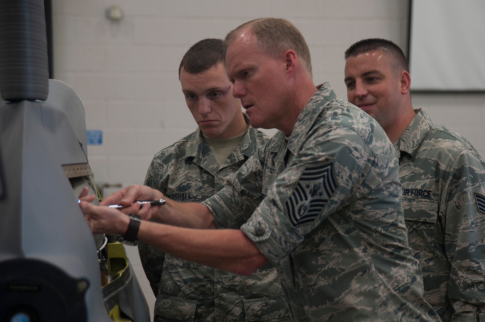 Chief Master Sgt. of the Air Force, James A. Cody, performs simulated missile maintenance under the supervision of 532nd Training Squadron instructors, July 8, 2014, Vandenberg Air Force Base, Calif. (U.S. Air Force photo by Michael Peterson/Released)