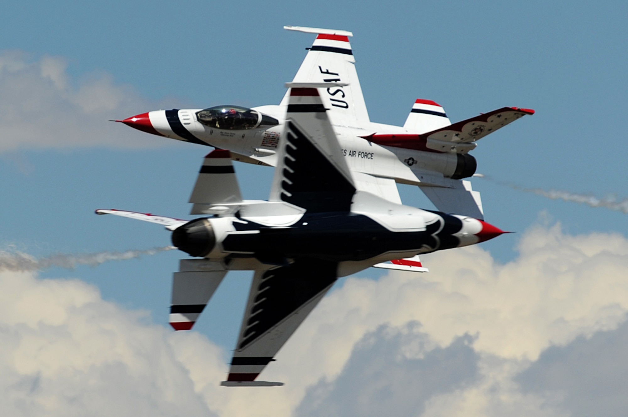 U.S. Air Force Maj's. Blaine Jones, Thunderbird 5, Lead Solo and Jason Curtis, Thunderbird 6, Opposing Solo, perform the Inverted Opposing Knife-Edge Pass during a practice show at the U.S. Air Force Academy, Colo., May 27, 2014.
(U.S. Air Force photo/Staff Sgt. Larry E. Reid Jr., Released)