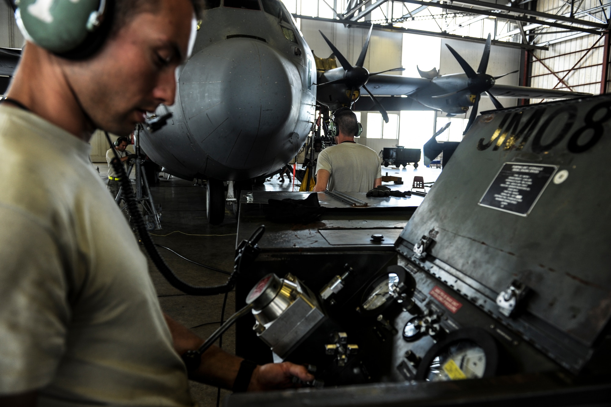 Airmen from the 314th Aircraft Maintenance Squadron lower a C-130J after performing  a landing gear check June 26, 2014, at Little Rock Air Force Base, Ark. Maintenance at Team Little Rock is a 24/7, 365-day operation, and with more than 1,800 C-130 students annually, maintenance within the formal training unit is vital to sustaining the future aircrews of combat airlift. (U.S. photo by Airman 1st Class Cliffton Dolezal)