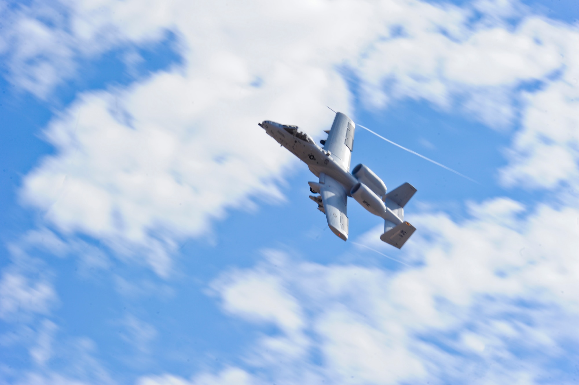 U.S. Air Force A-10 Thunderbolt II flies during the 2014 Hawgsmoke Competition at Barry M. Goldwater Range Two in Tucson, Ariz., July 10, 2014. This year’s Hawgsmoke competition focused on forward firing. The participants competed in high, medium, and low-angle strafes. (U.S. Air Force photo by Airman 1st Class Sivan Veazie/Released)