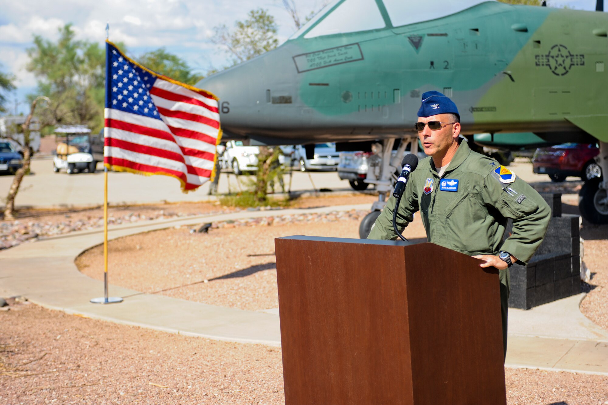 U.S. Air Force Col. Kevin Blanchard, 355th Fighter Wing commander, gives opening remarks during the opening ceremony of the 2014 Hawgsmoke Competition at Davis-Monthan Air Force Base, Ariz., July 9, 2014. As with tradition, since D-M won the last competition, the Desert Lightning Team is given the honor of hosting this year’s competition. (U.S. Air Force photo by Airman 1st Class Sivan Veazie/Released)