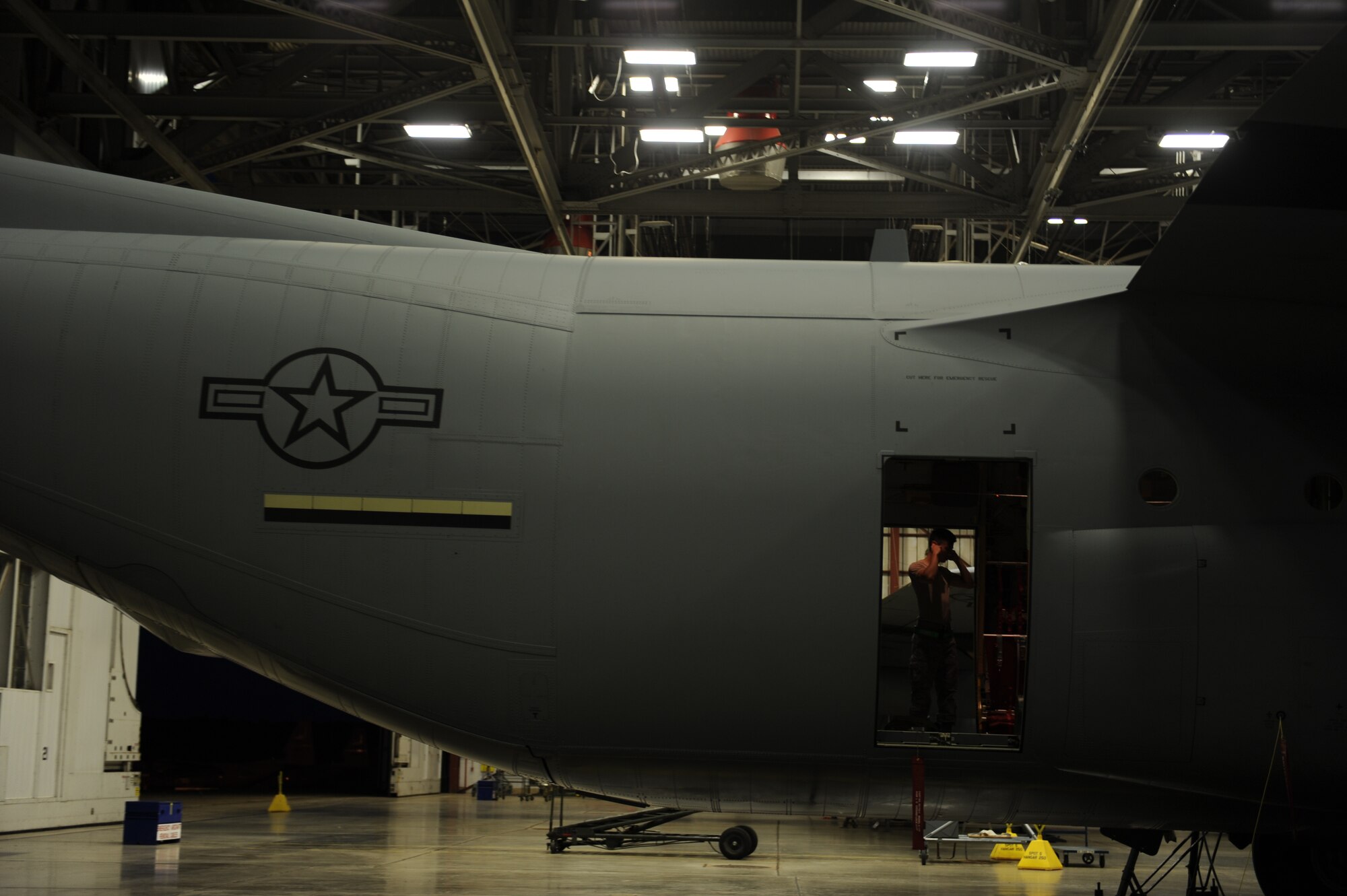 A maintainer from the 314th Aircraft Maintenance Squadron prepares to run a hydraulics check on a C-130 June 26, 2014, at Little Rock Air Force Base, Ark. Little Rock AFB is home to the largest C-130 fleet in the Air Force. (U.S. photo by Airman 1st Class Cliffton Dolezal)