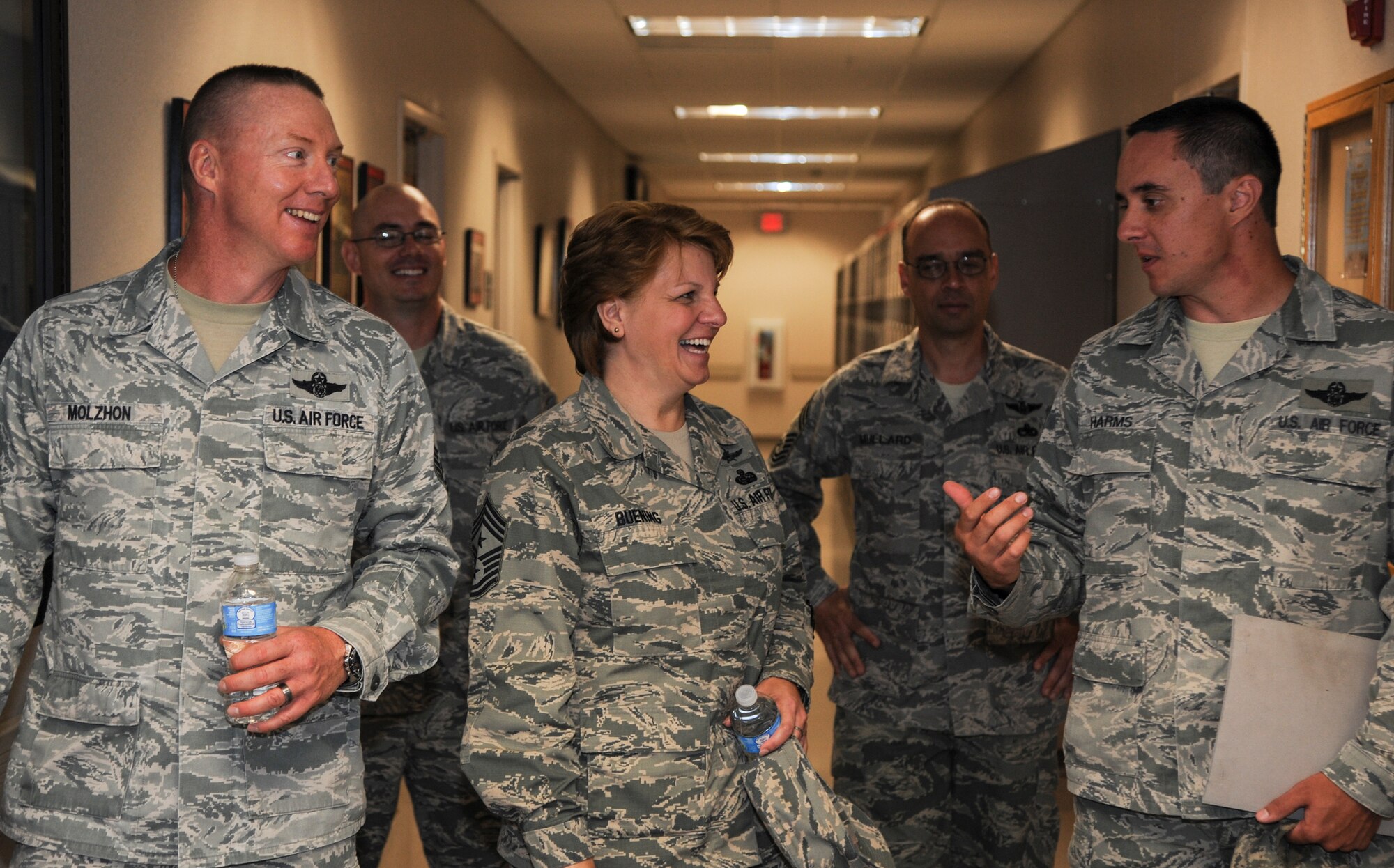 Chief Master Sgt. Rhonda Buening, 19th Airlift Wing command chief, takes a tour of the 50th Airlift Squadron June 3, 2014, at Little Rock Air Force Base, Ark. During her visit, Buening addressed concerns from loadmasters regarding manning issues. (U.S. Air Force photo by Airman 1st Class Harry Brexel)