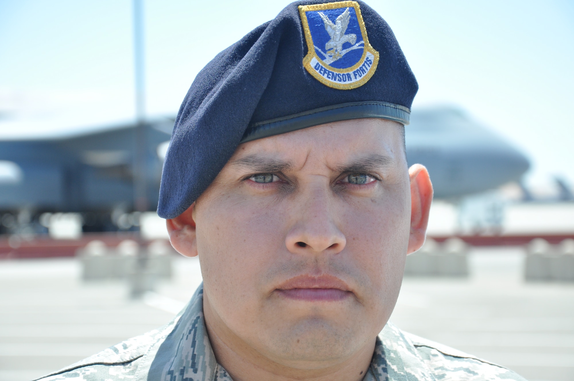 Tech. Sgt. David Lopez, 60th Security Forces Squadron NCO in charge of mobility and resources, stands Tuesday on the flightline at Travis. 
