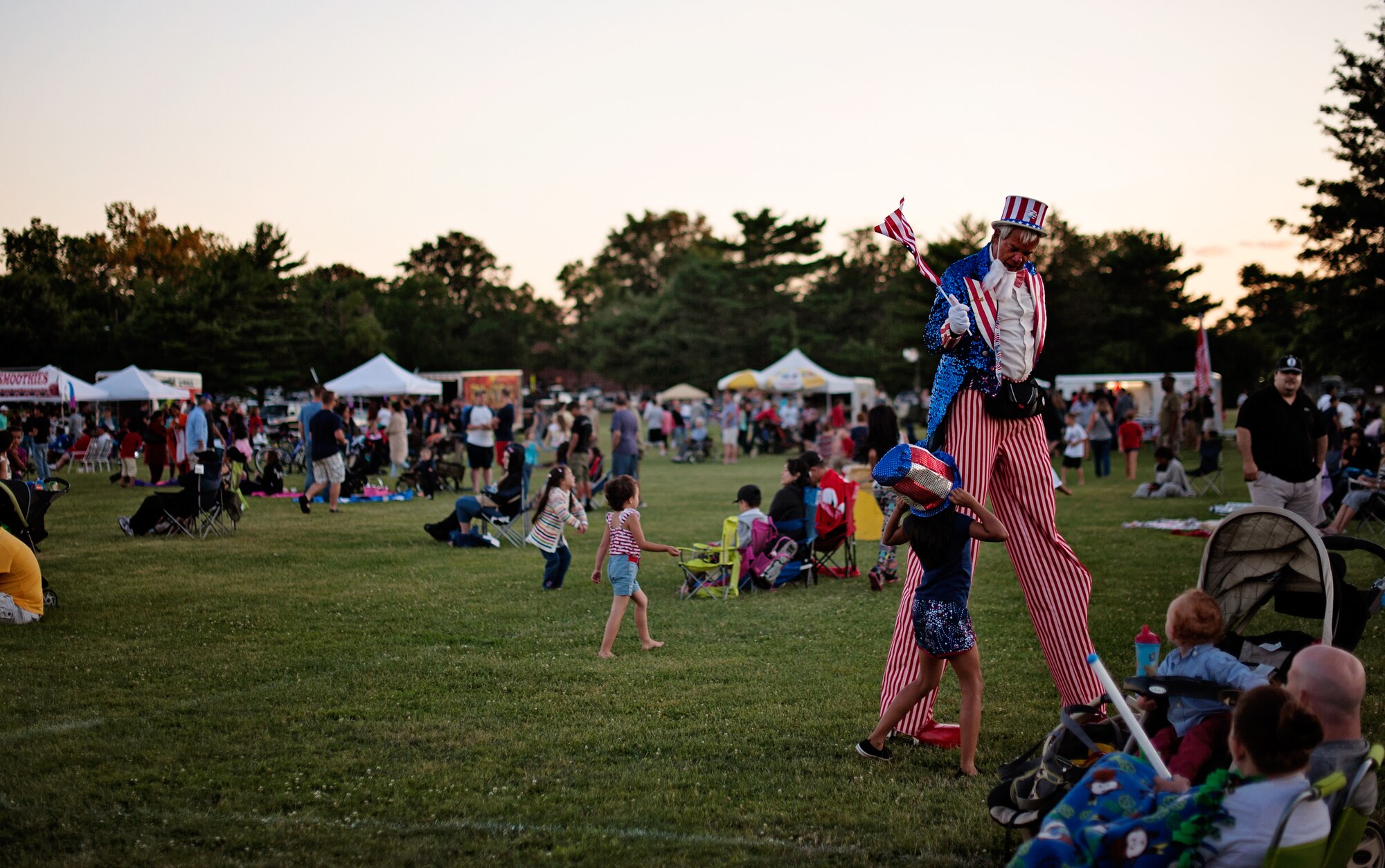 More than 25,000 people attended the Joint Base McGuire-Dix-Lakehurst 2014 Independence Day Open House held at Doughboy Field, July 4, 2014. The event featured traditional Fourth of July foods, fireworks, games, live entertainment and music. (U.S. Air Force photo/Staff Sgt. Katherine Tereyama)