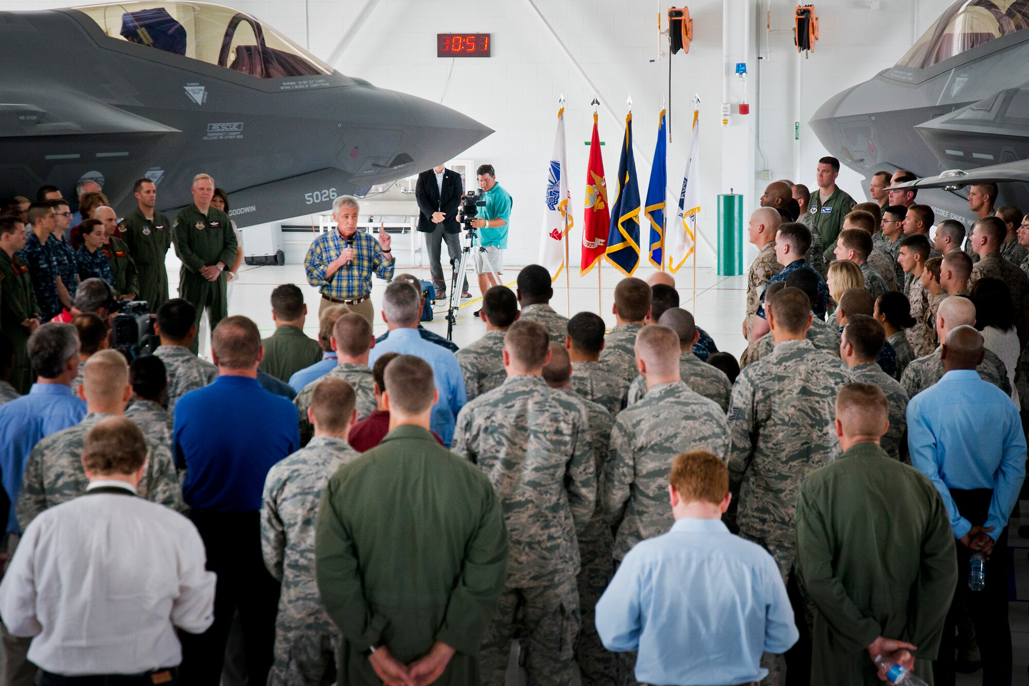 Defense Secretary Chuck Hagel addresses 33rd Fighter Wing service members during a troop call July 10 at Eglin Air Force Base, Fla.  Hagel visited the base to tour the wing and the F-35 Lightning II integrated training center.  During his tour, he held a 45-minute troop call to praise the work of the service members who began and continue to improve the DOD’s newest fighter program.  (U.S. Air Force photo/Samuel King Jr.)